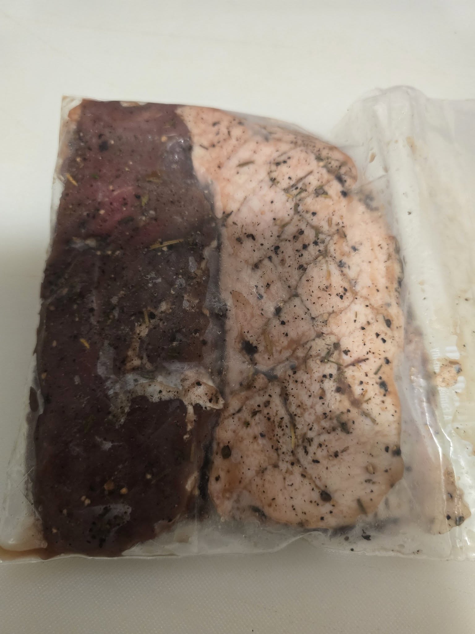 Duck breasts being cured