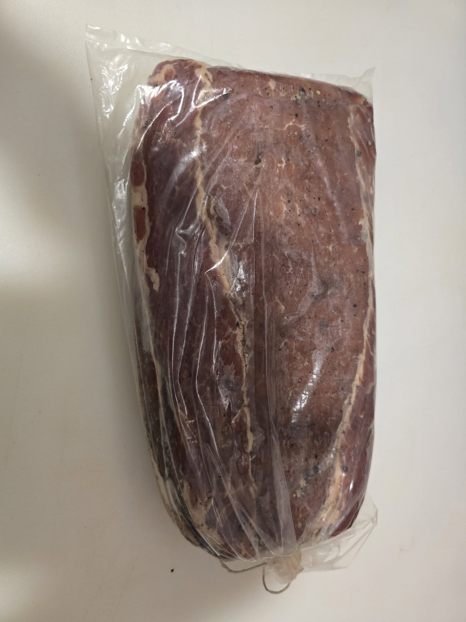 Lonza in a curing bag